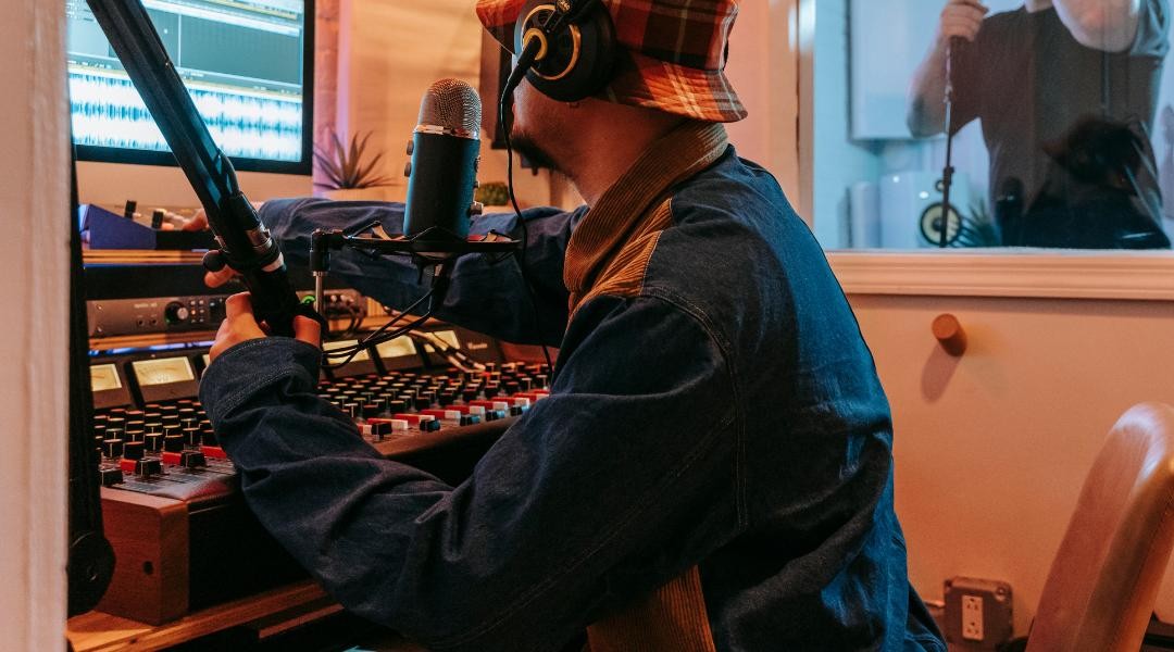 men recording in studio