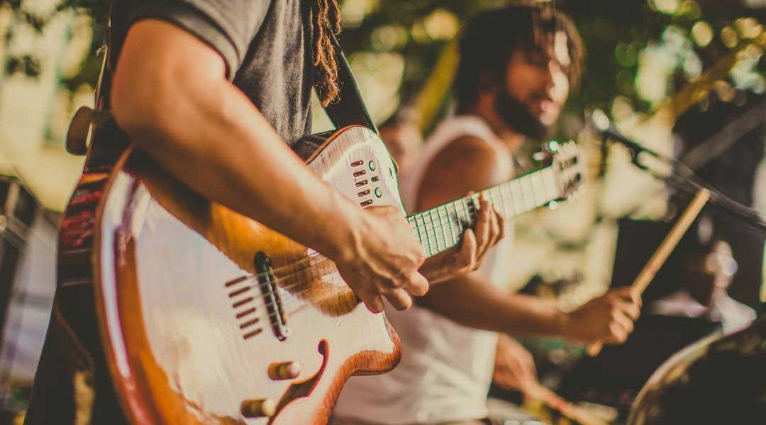 person playing the guitar