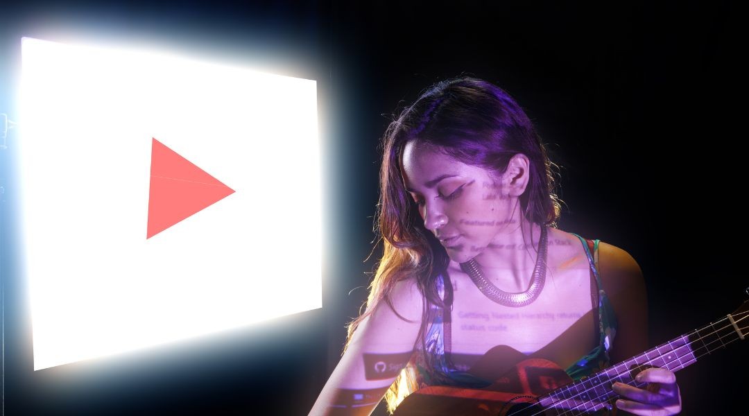 woman playing a ukelele and a play button as a background